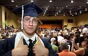 with anticipation in the hallway with other graduates before