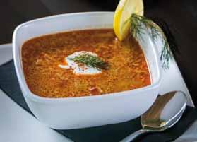 Forest fruit cream soup with vanilla ice cream and mint
