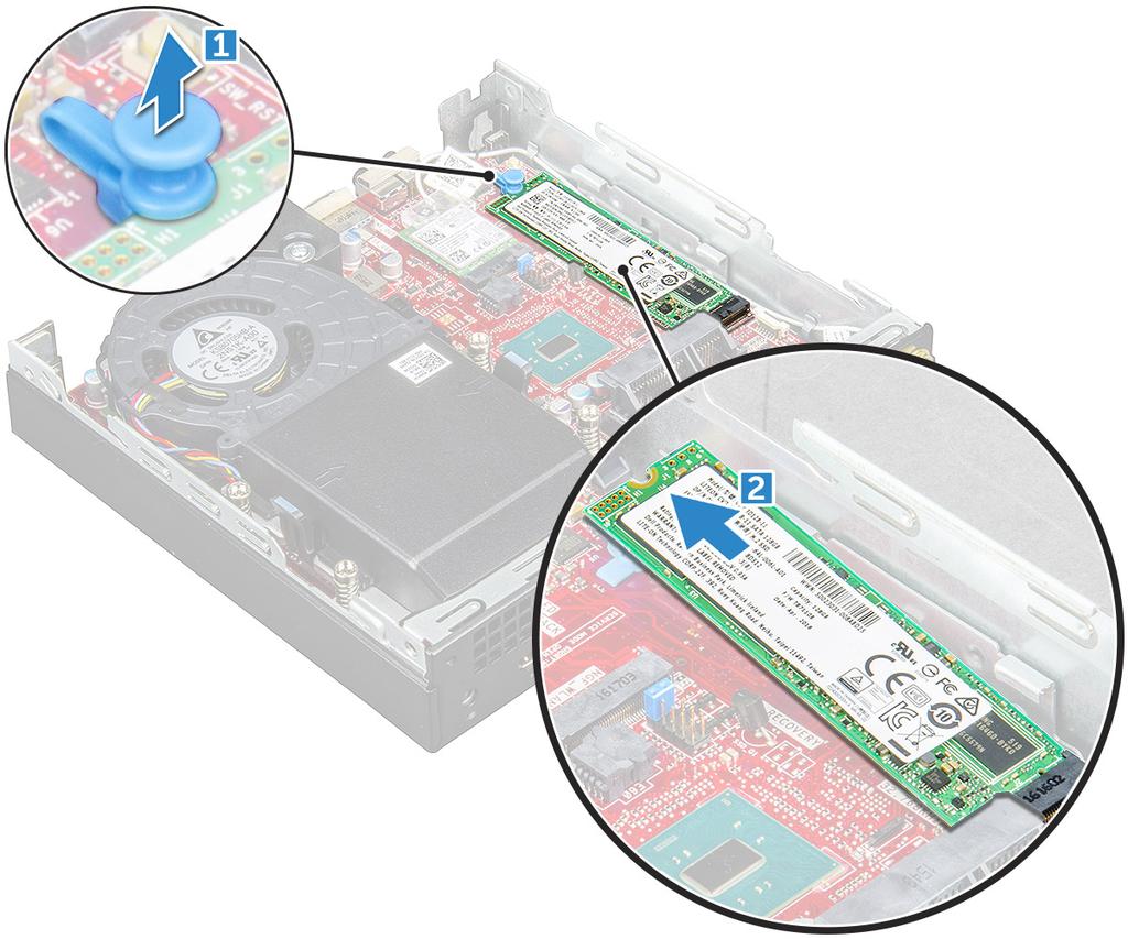 A M.2 PCIe SSD beszerelése 1 Helyezze be az M.2 PCIe SSD-t a csatlakozóba. 2 Az M.2 PCIe SSD rögzítéséhez nyomja le a kék fület.