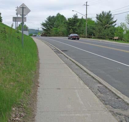 High # of Curb Cuts: 0 Residential 1 Non-residential Density of Curb Cuts: 12 per mile Notes: There is a fairly steep hill down to the River St intersection.