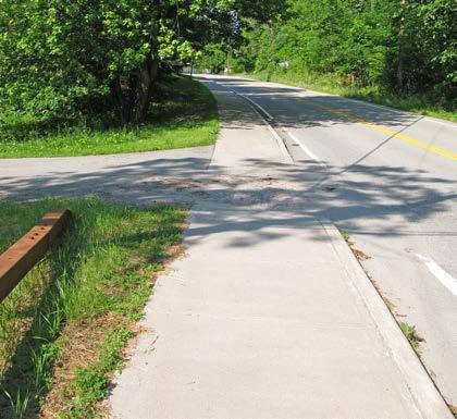 Moderate High # of Curb Cuts: 7 Residential 0 Non-residential Density of Curb Cuts: 39 per mile Notes: Recommendations: There is some deterioration of the sidewalk near the intersection with Maple St
